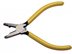 Side view of Platinum Tools connector Pressing Telcom Pliers with yellow Vinyl handles, a built-in side-cutter and coil spring. - 0 of 1