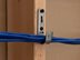 3/4 inch J-hook supporting cable bundle between studs - 11 of 13
