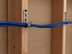3/4 inch J-hook supporting cable bundle between studs - 12 of 13